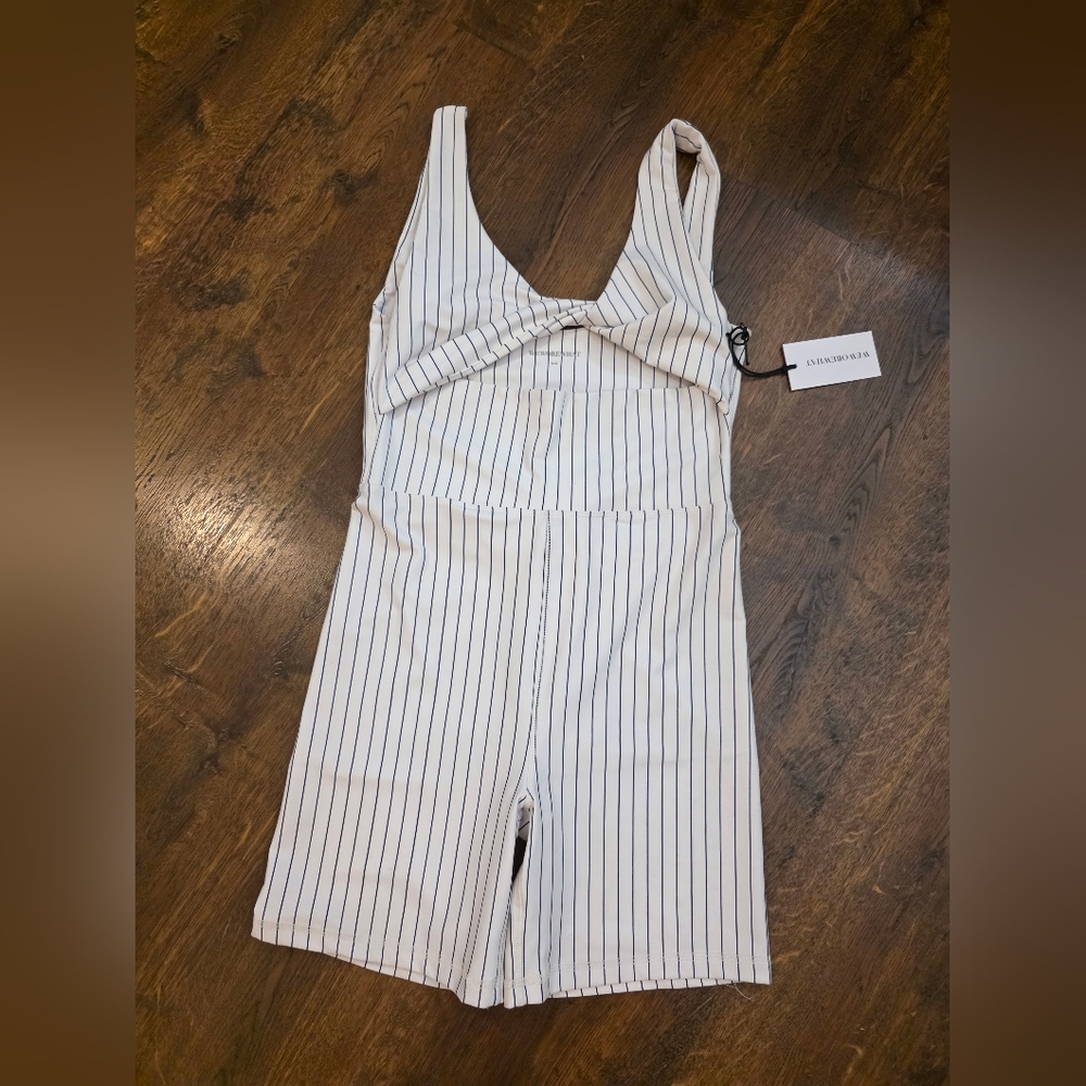 New WEWOREWHAT Twist Cutout Bodysuit 🤍